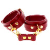 TABOOM Menottes de poignets Taboom Rouges
